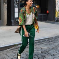 Guest is seen wearing a printed shirt and green pants outside the Head of State show during New York Fashion Week on September 13, 2023 in New York...