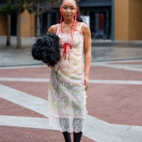 Guest is seen wearing black bag, transparent dress outside Simone Rocha during London Fashion Week September 2023 on September 17, 2023 in London,...