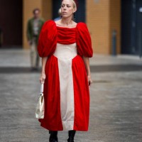 Guest is seen wearing two tone red beige dress outside Simone Rocha during London Fashion Week September 2023 on September 17, 2023 in London,...