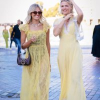 Guest wearing yellow lace dress during Australian Fashion Week Presented By Pandora 2024 at Carriageworks on May 14, 2024 in Sydney, Australia.