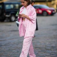 Guest wears black sunglasses, a white tank-top, a pale pink embroidered crystals heart pattern oversized shirt, matching pale pink embroidered...
