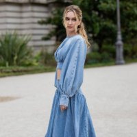 Guest wears denim cut out dress outside Zimmermann during the Womenswear Fall/Winter 2025/2026 as part of Paris Fashion Week on March 10, 2025 in...