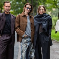 Guest wears suit & Marianne Theodorsen wears brown wild leather jacket, denim jeans with print, blue bag, grey shirt & Tine Andrea wears grey scarf,...