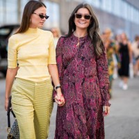 Guests seen outside Ganni during the Copenhagen Fashion Week Spring/Summer 2019 on August 9, 2018 in Copenhagen, Denmark.