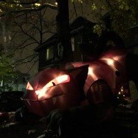 halloween decoration featuring a giant cat with glowing eyes on a front yard somewhere in a toronto suburb - garden decoration stock pictures, royalty-free photos & images
