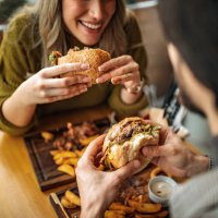 hamburger for two - junk food stock pictures, royalty-free photos & images