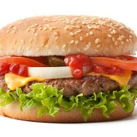 hamburger on sesame seed bun with fixings - junk food stock pictures, royalty-free photos & images