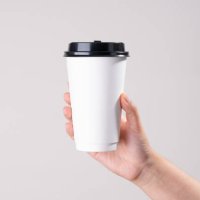 hand holding white paper cup - junk food stock pictures, royalty-free photos & images