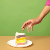 hand reaching for cake - junk food stock pictures, royalty-free photos & images