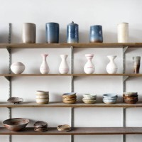 handmade ceramic vases and dishes on display in a shop - home decoration stock pictures, royalty-free photos & images