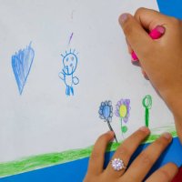 hands of a preschool child drawing and coloring on sheet of paper - nails art stock pictures, royalty-free photos & images