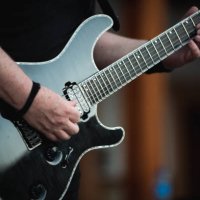 hands playing a chord on an electric guitar - concert stock pictures, royalty-free photos & images