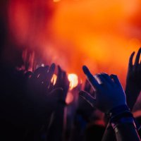 hands raised, cheering in concert audience - concert stock pictures, royalty-free photos & images