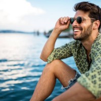handsome smiling man looking away. - fashion stock pictures, royalty-free photos & images