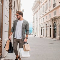 handsome young man in shopping - fashion stock pictures, royalty-free photos & images