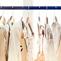 hangers with clothes - fashion stock pictures, royalty-free photos & images