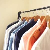 hanging shirts on open wardrove - home decoration stock pictures, royalty-free photos & images