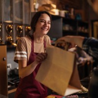 happiness while serving customer - junk food stock pictures, royalty-free photos & images