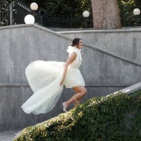 happy beautiful bride walks up the stairs - fashion stock pictures, royalty-free photos & images