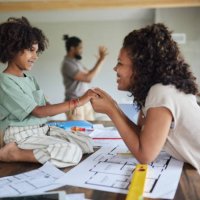 happy black mother and daughter talking during renovation process. - home decoration stock pictures, royalty-free photos & images