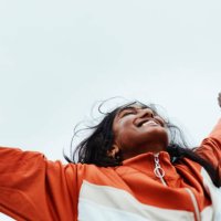happy black woman, freedom and sky for success in adventure, travel or achievement in the outdoors. female winner celebrating goal being free in nature for successful traveling to india in happiness - travel stock pictures, r