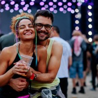 happy couple posing at concert - concert stock pictures, royalty-free photos & images