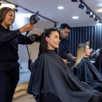 happy customers at the hair salon - hairstyle stock pictures, royalty-free photos & images