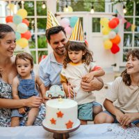 happy family at a birthday party - garden decoration stock pictures, royalty-free photos & images