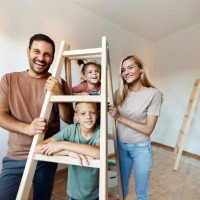happy family during home renovation process. - home decoration stock pictures, royalty-free photos & images