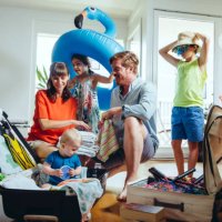 happy family of five packing for holiday trip - travel stock pictures, royalty-free photos & images