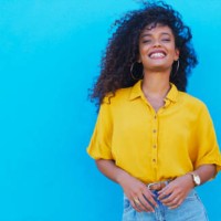 happy, fun and portrait of a woman on a blue background with mockup for fashion information. smile, young and a stylish girl or model with space on a wall in the city with an urban personality - fashion stock pictures, royalt