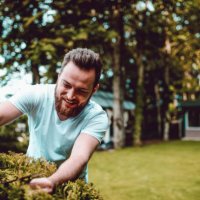happy gardener working in his natural habitat - garden decoration stock pictures, royalty-free photos & images