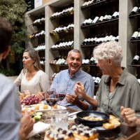 happy group of friends having dinner at a restaurant - food stock pictures, royalty-free photos & images