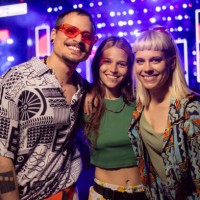 happy hipster friends enjoying on a music festival by night. - concert stock pictures, royalty-free photos & images