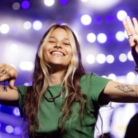 happy hipster woman dancing on a night music concert. - concert stock pictures, royalty-free photos & images
