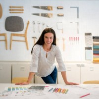 happy interior designer working the office and smiling - home decoration stock pictures, royalty-free photos & images