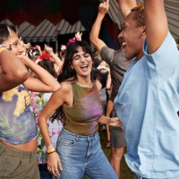 happy man and women dancing at concert - concert stock pictures, royalty-free photos & images