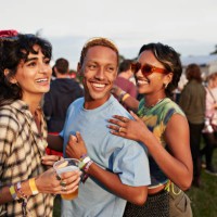 happy man with friends enjoying music festival - concert stock pictures, royalty-free photos & images