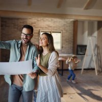 happy parents making plans in their new home. - home decoration stock pictures, royalty-free photos & images