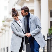 happy romantic couple flirting in the city street - fashion stock pictures, royalty-free photos & images