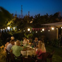 happy senior friends on birthday party at backyard - garden decoration stock pictures, royalty-free photos & images