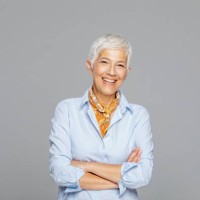 happy senior woman against grey background. - fashion stock pictures, royalty-free photos & images