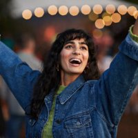 happy woman dancing to music - concert stock pictures, royalty-free photos & images