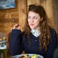 happy woman eating out in a restaurant - food stock pictures, royalty-free photos & images