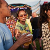happy woman enjoying music festival with friends - concert stock pictures, royalty-free photos & images