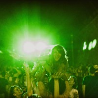 happy woman having fun with her friends on a music concert by night. - concert stock pictures, royalty-free photos & images