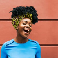 happy woman infront of wall - fashion stock pictures, royalty-free photos & images