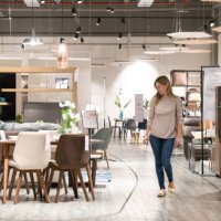 happy woman shopping at a furniture store - home decoration stock pictures, royalty-free photos & images