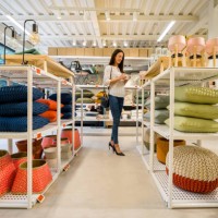 happy woman shopping at a home decor store - home decoration stock pictures, royalty-free photos & images