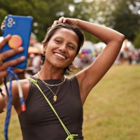 happy woman taking selfie through smart phone - concert stock pictures, royalty-free photos & images